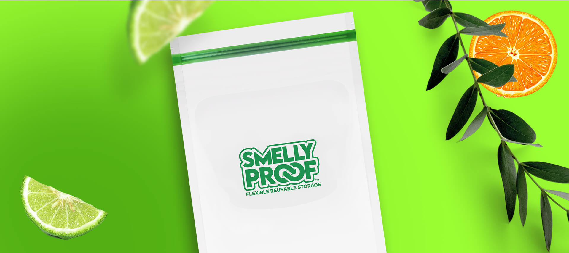 Large Green Background With a Large Smell Proof Ziplock Bag and Limes and Orange and a Leaf